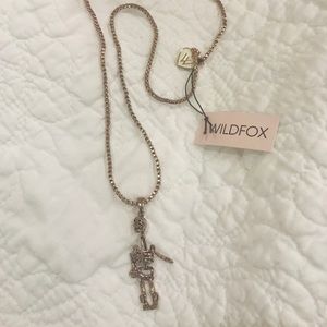 Hematite chain necklace with miniature skeleton